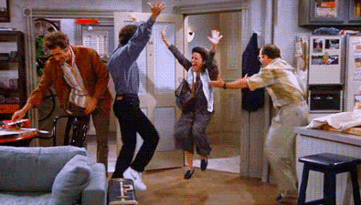 Seinfeld celebration - all four main characters are running and dancing on the spot with their arms up high.
