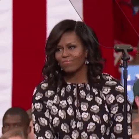 Michelle Obama applauding