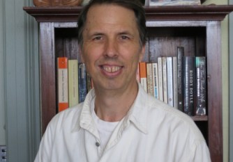 A photograph of Kevin smiling