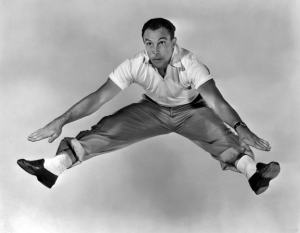 Gene Kelly dancing wearing white socks and black shoes