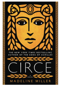 Ancient Greek pottery style painting of amber on black of a woman's face whose hair is styled like the leaves from a wreath. Really striking.