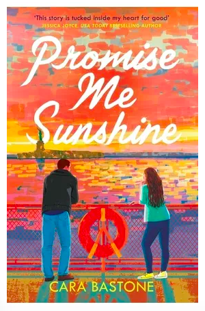 The book cover is a cartoon of two people standing on a ferry looking over a sunrise (or sunset), orange sky with orange sea, the two people in blues with the statue of Liberty on the horizon.